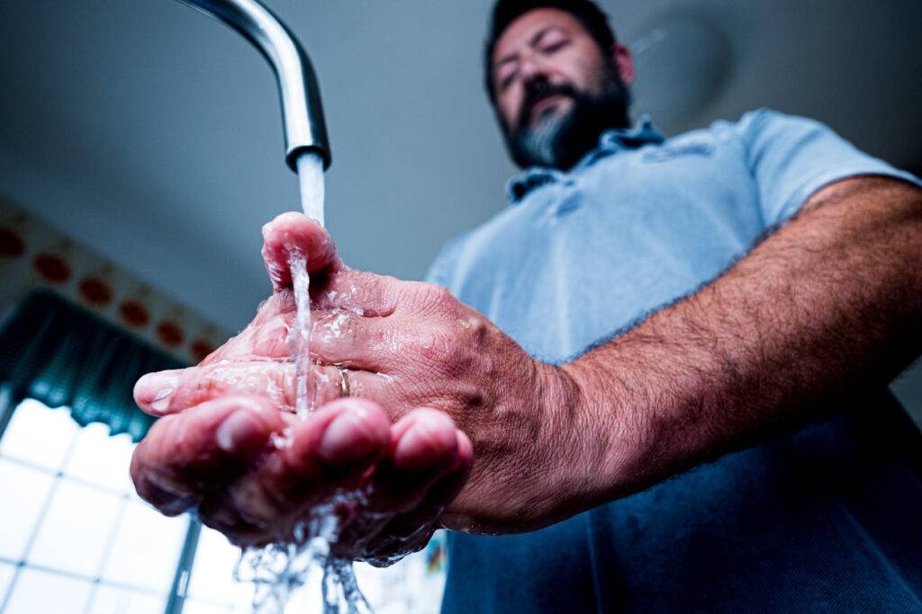 close up and portrait of hands of man cleaning and 2023 11 27 05 21 32 utc