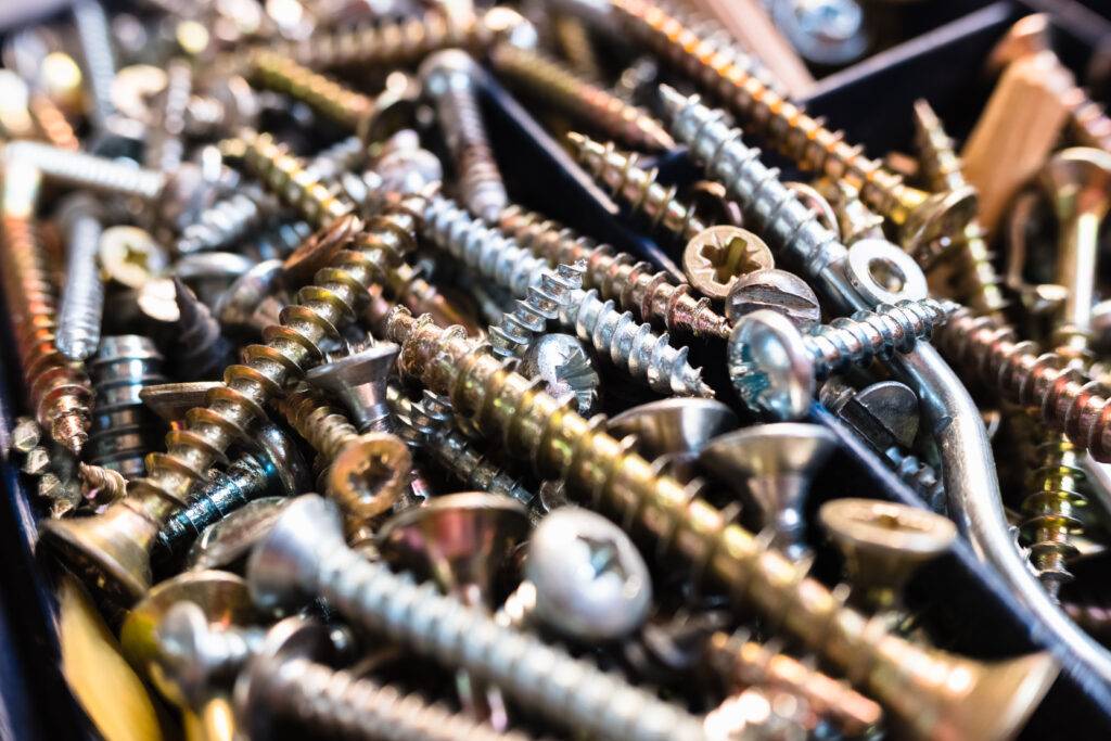 macro of many silver and gold screws of different 2023 11 27 05 33 55 utc