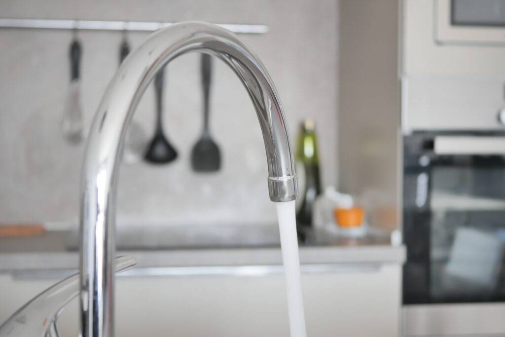 water pouring from a faucet tap slow motion 2023 11 27 05 16 09 utc